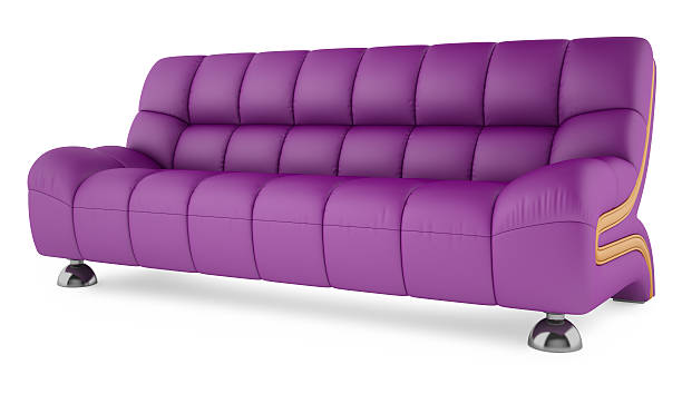 Purple sofa on a white background stock photo