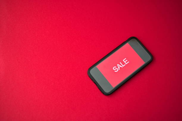 istock Sale text on screen of smartphone 1550213691
