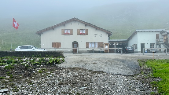 Vals, Switzerland - July, 13th - 2023: Alm with cow stables on 2000m height.