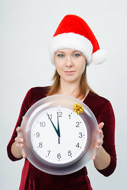 istock young attractive girl with a clock 155026757