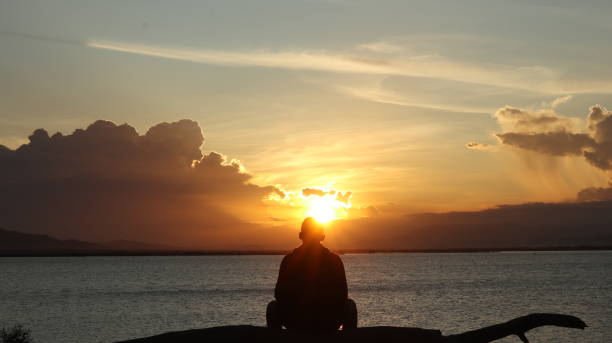 istock silhouette of man on the lake 1550283918