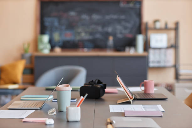 istock Background image of office workspace with VR headset on meeting table 1550314545