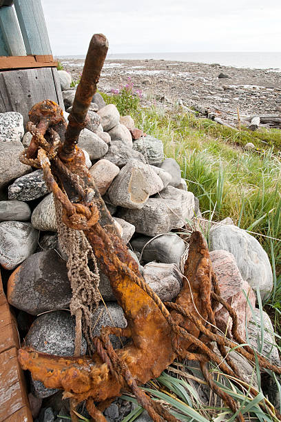 old rusty anchor stock photo