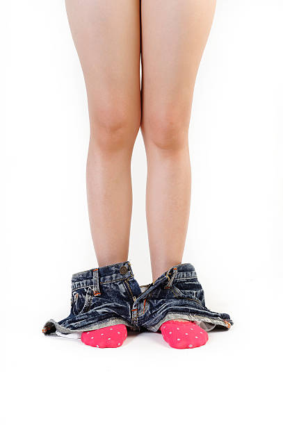 istock woman caught with pants down on white background 155032185