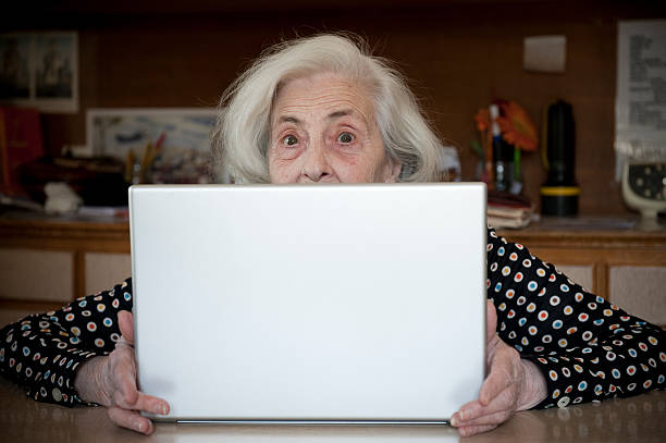 istock Senior woman and notebook (surprise) 155032690