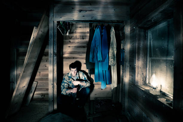 istock Man with a machete hiding in closet 155032867