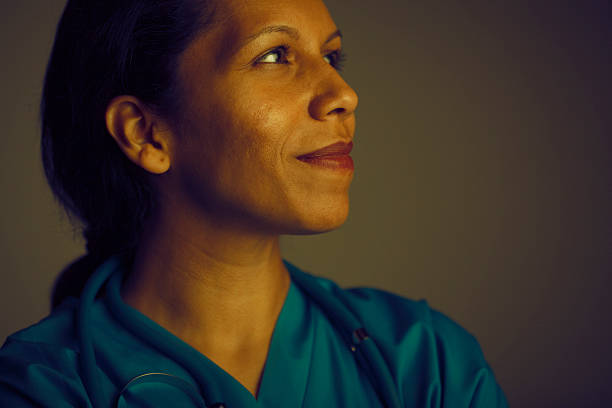 istock hopeful female doctor 155033159