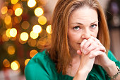 Serious and Concerned Woman at Home During Holiday Season