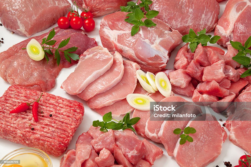Variedade de carnes cruas - Foto de stock de Bife royalty-free