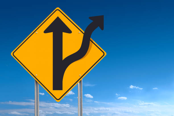 istock Road Less Traveled Directional Sign Post Over Blue Sky Background 155034723