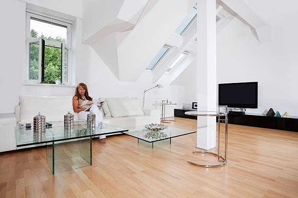 istock Middle aged woman in her nice attic flat 155035065