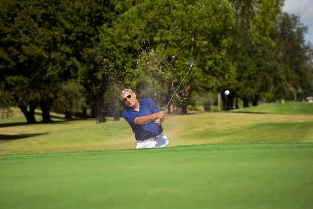 istock Senior golfer in Sandtrap 155035128