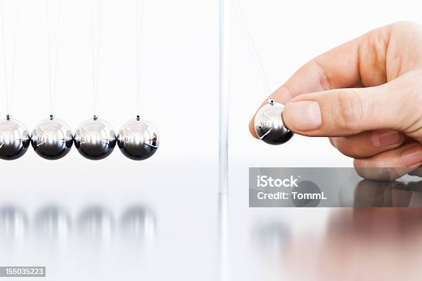 Newtons Cradle Stock Photo - Download Image Now - Newton's Cradle, Sphere, Motivation