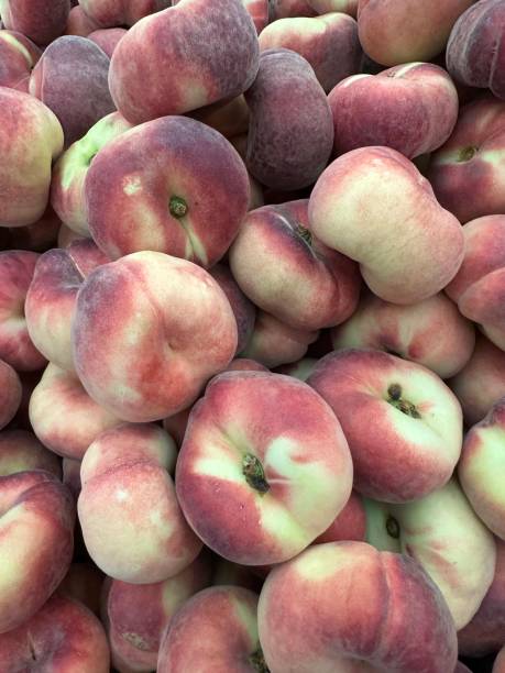 istock full frame of doughnut peach 1550356595