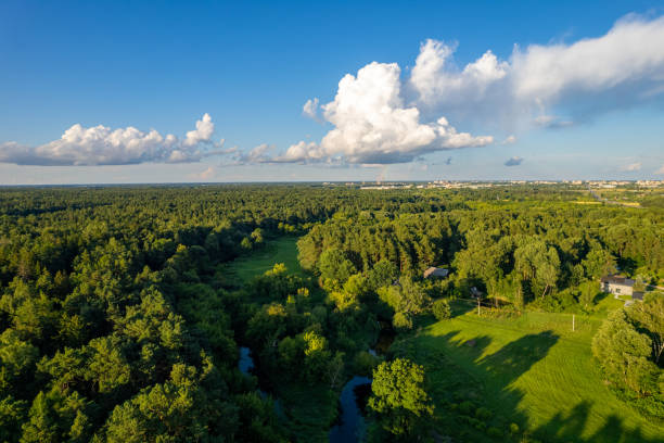 istock Aerial summer sunny sunset view of nature river and fields in Lithuania 1550367263