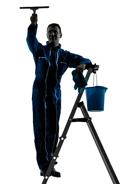 man window cleaner worker silhouette one caucasian man window cleaner  worker silhouette in studio on white background custodian silhouette stock pictures, royalty-free photos & images
