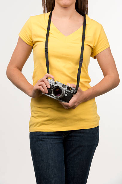 Young female with a camera stock photo