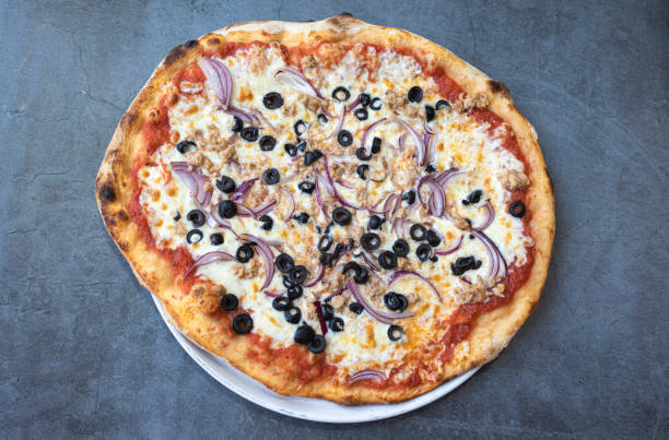 tuna pizza. neapolitan pizza with mozzarella and tuna. higher life. authentic italian recipe. - pizza tuna prepared fish cheese imagens e fotografias de stock