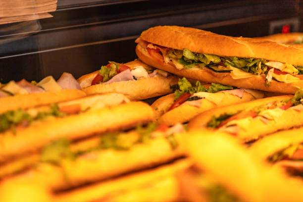 istock Hot sandwiches in the bakery. Fresh bakery. 1550417395