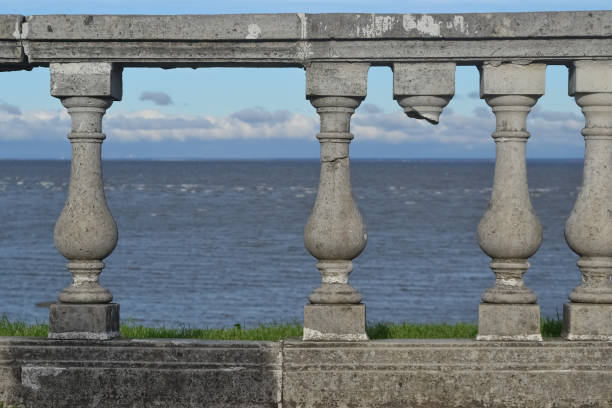 istock Stone balustrade on the seashore with sea in the background 1550421614