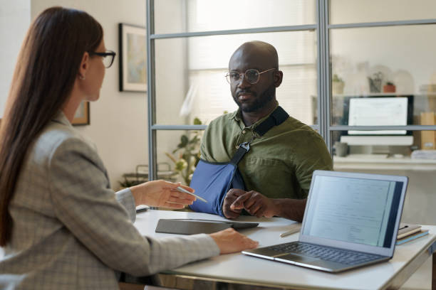 istock Man having meeting with insurance agent in office 1550429842
