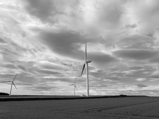 istock Wind turbine against cloudy skies 1550438130