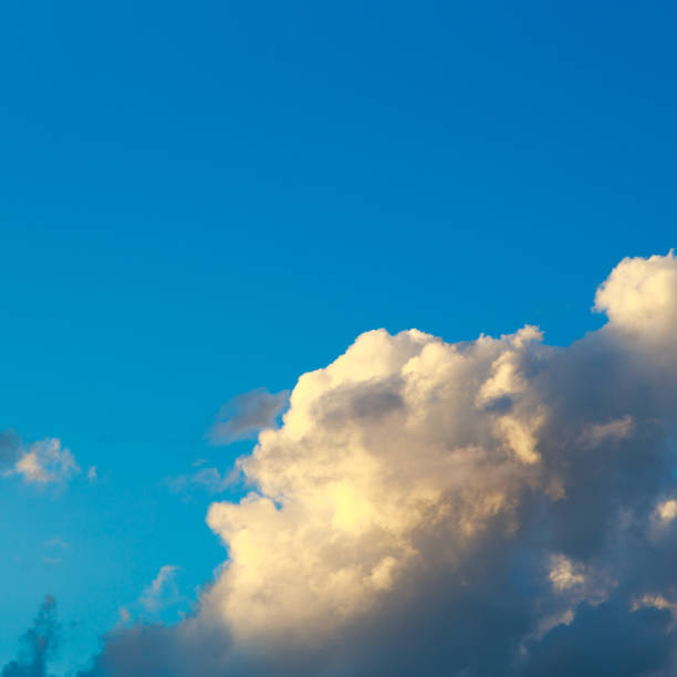 istock Pink vanilla heaven. Bright blue sky with gentle cumulus clouds. Dawn summer background. 1550449121