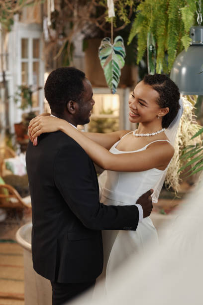 istock Young black couple getting married and dancing together 1550451136