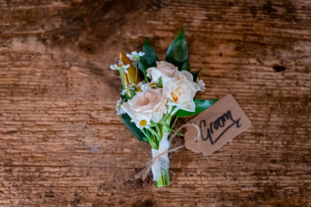 Groom button hole wedding flowers