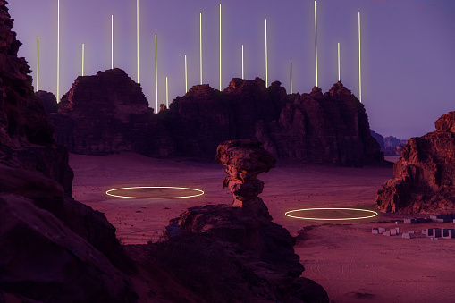 Bright neon ellipse and lines at dramatic martian landscape with rocks and mountains at Wadi Rum, Jordan - Metaverse, Web3 inspiration