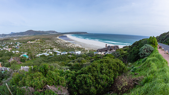 Noordhoek Dunes Beach Houses overlooking scenic Atlantic ocean landscape from Chapmans Peak Drive route Cape Town.