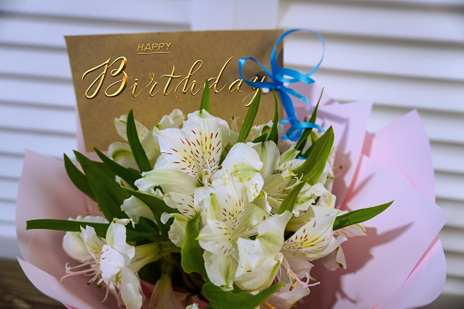 postcard , Internet banner  with a birthday greeting, with the inscription - happy birthday, bouquet of flowers