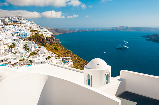 White architecture in Santorini island, Greece. Panoramic view of the island. Travel and summer vacations concept