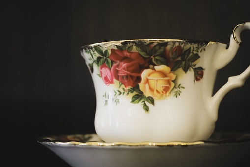 A closeup of a vintage teacup with floral patterns in Lakeside, Ohio