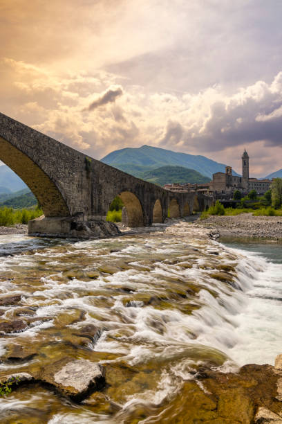 istock Gobbo Bridge also Devil Bridge or Ponte del Diavolo or Ponte Gobbo in Bobbio, Piacenza province, Trebbia Valley, Emilia Romagna, Italy 1550665955