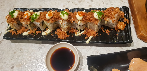 Indonesian japanese fusion food, japanese food cook in indonesian style, gyukatsu, beef karage, salad, and tofu soup in local indonesian restaurant