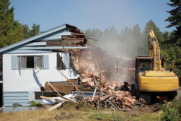 Photo of House being bulldozed in Vancouver
