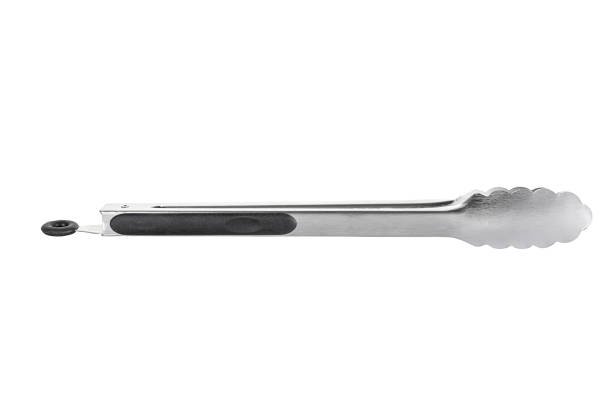 istock Barbecue and grill spatula bottle hook tongs tools set on White Background 1550672215