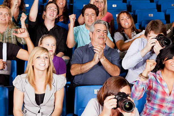 istock Diverse large group of people watching an exciting game 155068775