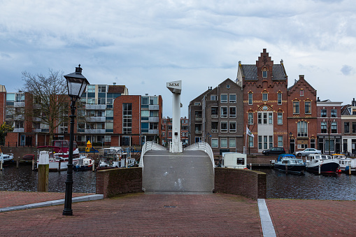 Traditional canal houses and a bridge in Gorinchem in the Netherlands