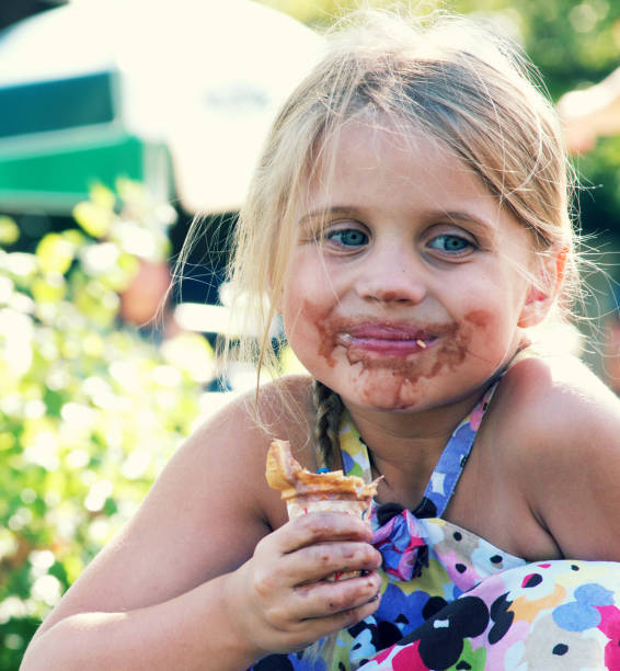 Toddler's Face looking for something and sweaty on her face . High resolution image gallery.