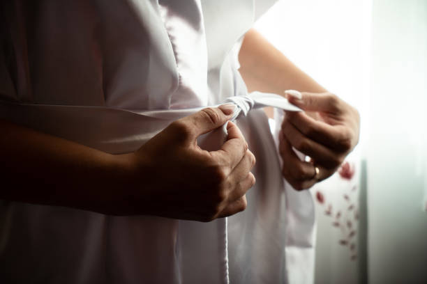 istock Romantic wedding dress hands bride 1550693509