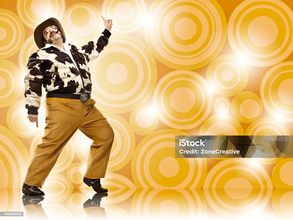 1970s vintage rich cowboy disco dance move on brown  Disco Dancing Stock Photo