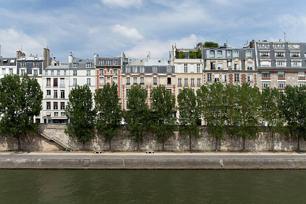 istock row of apartment buildings by a river 155071041