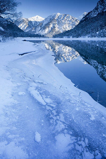 istock winter at lake plansee in tirol - austria 155071071