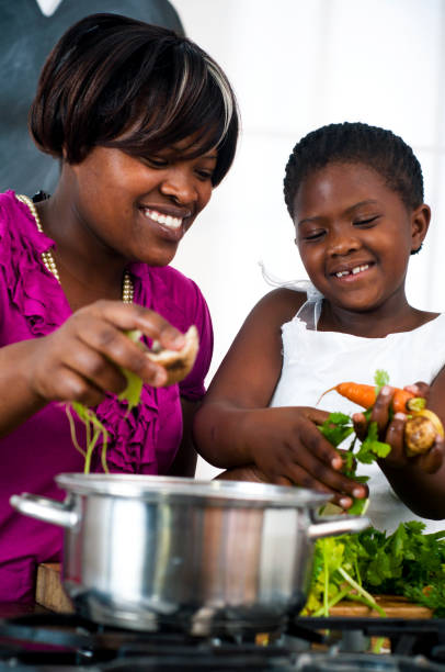 istock Mother and daugter cooking 155071621