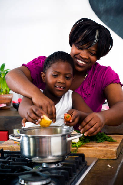 istock Mother and daugter cooking 155071643