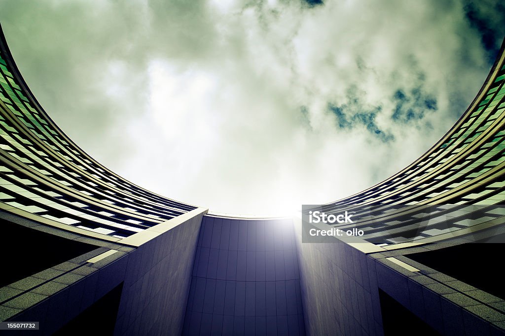 Low-angle view of a round office buildings atrium facade  Architectural Feature Stock Photo