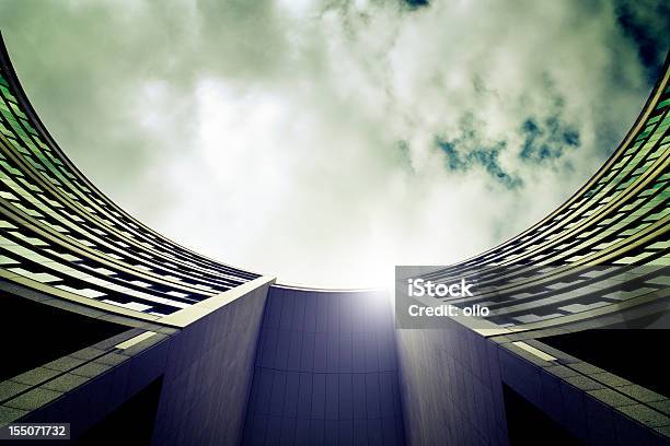 Lowangle View Of A Round Office Buildings Atrium Facade Stock Photo - Download Image Now
