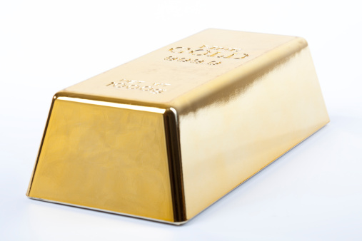 Gold bar and coin  on the presentation stand . wealth concept, treasure, and trading, investment,